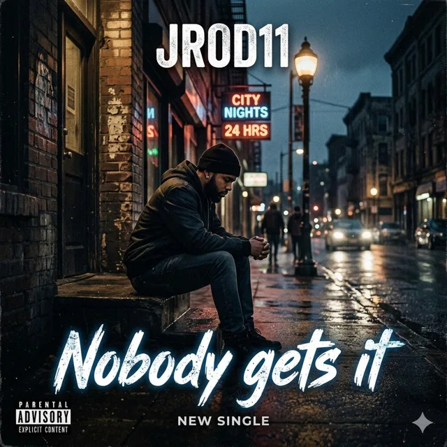 “No Body Gets It” cover art — a man sitting alone on a wet city street at night under a streetlamp: “Nobody gets it”